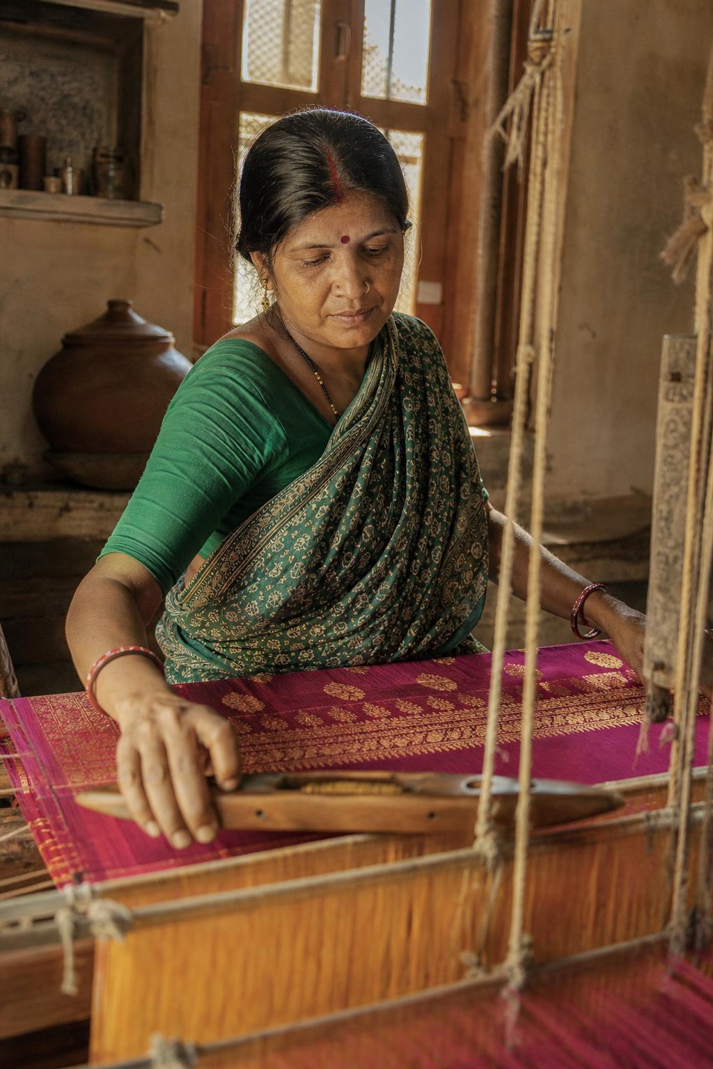 A master weaver at the pit loom in Varanasi